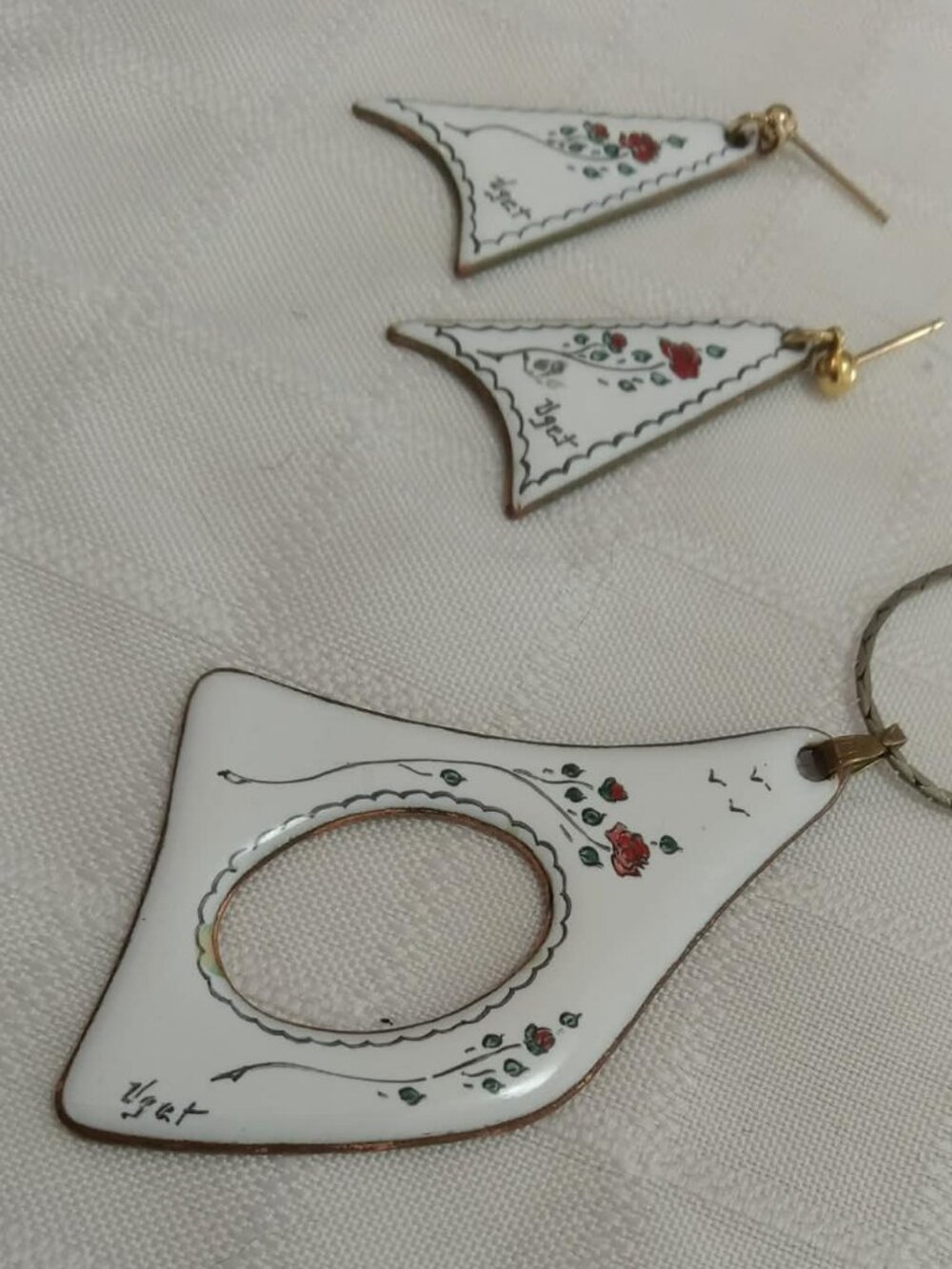 A beautiful set of a chain necklace and earrings made of enameled metal, signed